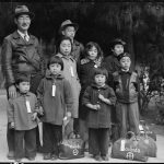 A Dorothea Lange photograph of a Japanese family relocated in 1942