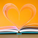 Image of a book with pages making the shape of a heart
