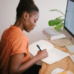 Photo of a woman at a computer