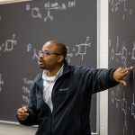 Dwight Williams teaching a Chemistry class